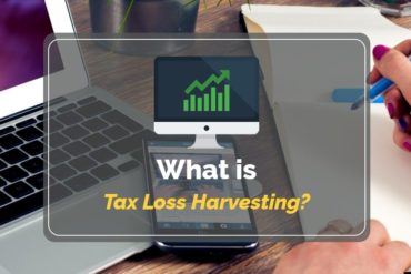 A person takes notes at a desk with a laptop, phone, and plant; text reads What is Tax Loss Harvesting? A strategy to offset gains.